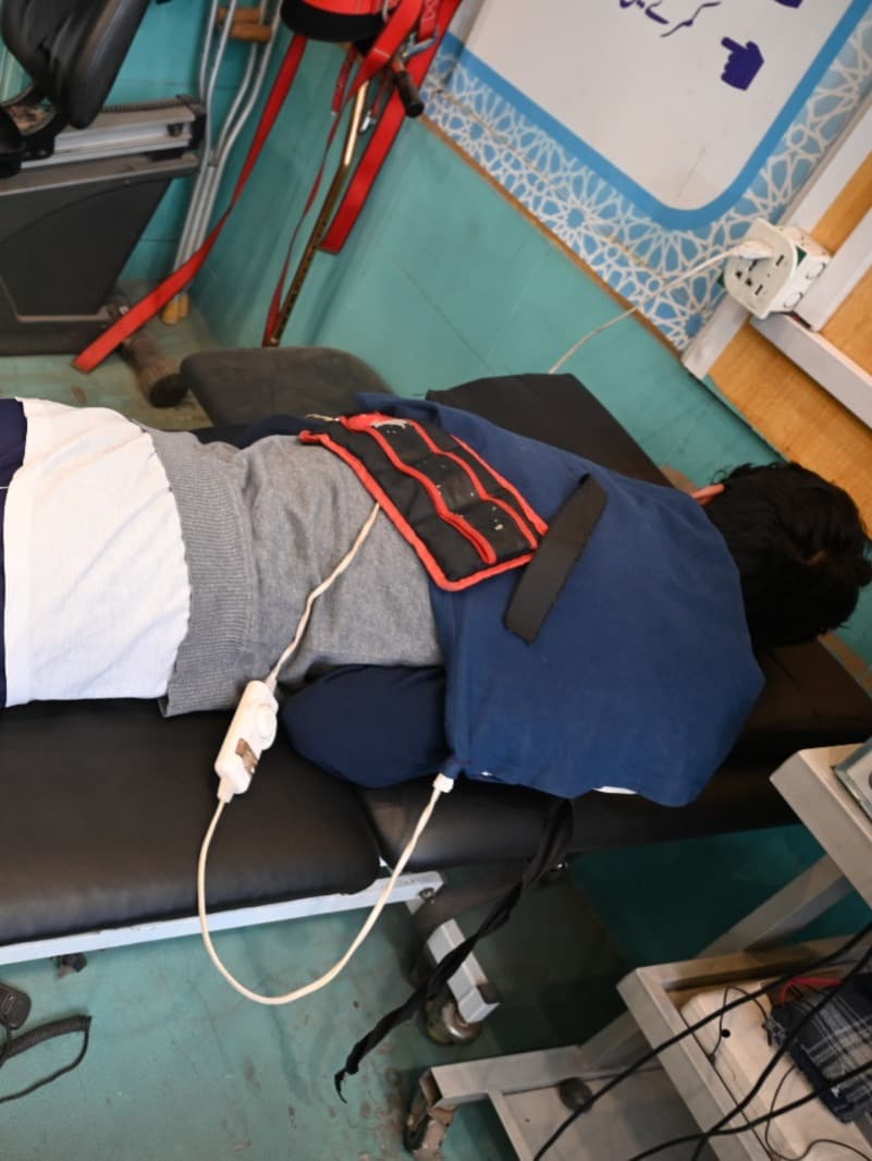 Patient receiving physiotherapy treatment